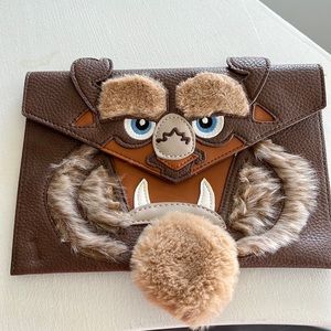 Disney “beast” of the beauty and the beast clutch collection